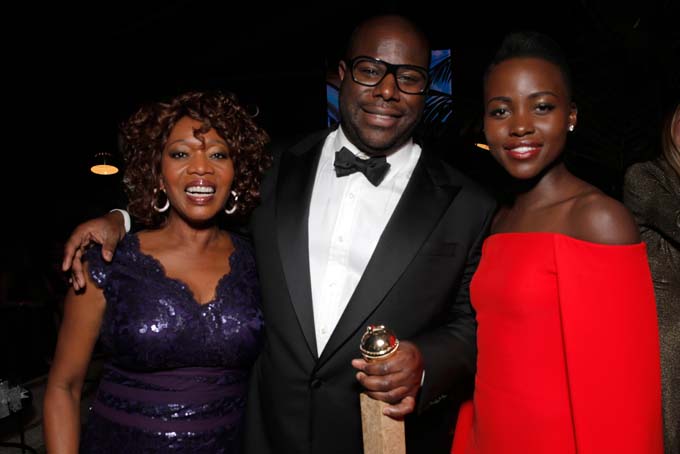 From left, Alfre Woodward, Steve McQueen, and Lupita Nyong'o attend the FOX after party for the 71st Annual Golden Globes award show on Sunday, Jan. 12, 2014 in Beverly Hills, Calif. (Photo by Todd Williamson/Invision for FOX Broadcasting Company/AP Images)
