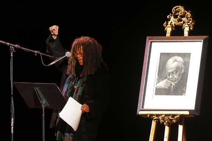 Poet Sonia Sanchez reads a poem during the funeral of poet Amiri Baraka Saturday, Jan. 18, 2014, in Newark, N.J. (AP Photo/Jason DeCrow)