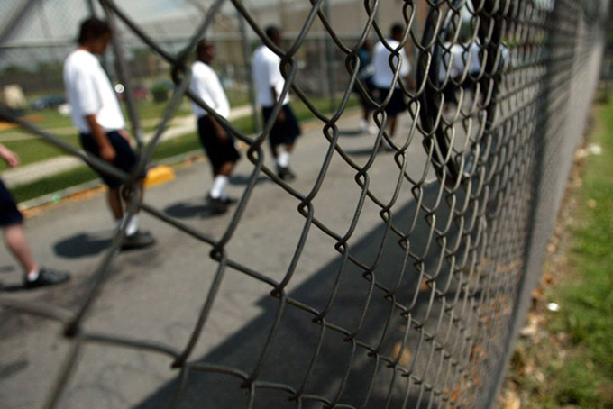 Juvenile offenders file in for lunch at the Cheltenham Youth Facility in Maryland, in May 2004. (Matt Houston/AP Photo)