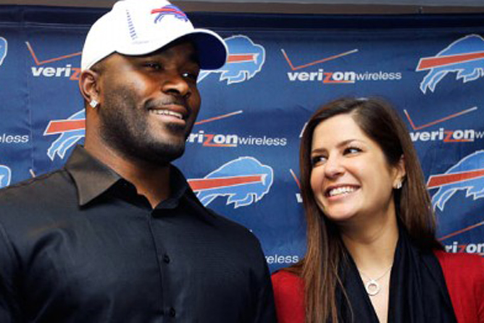 Buffalo Bills defensive Mario Williams, Erin Marzouki, in happier days. (Image credit: David Duprey/AP)