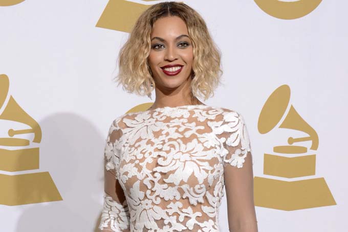 This Jan. 26, 2014 file photo shows Beyonce at the 56th annual Grammy Awards in Los Angeles. (Photo by Dan Steinberg/Invision/AP, FIle)