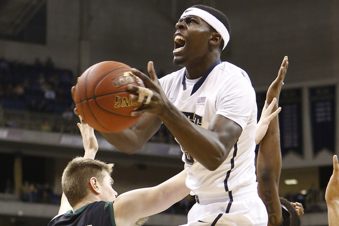 Pittsburgh's Durand Johnson (5) shoots over Cal Poly's Zach Gordon in the first half of the NCAA college basketball game on Saturday, Dec. 21, 2013, in Pittsburgh. (AP Photo/Keith Srakocic)