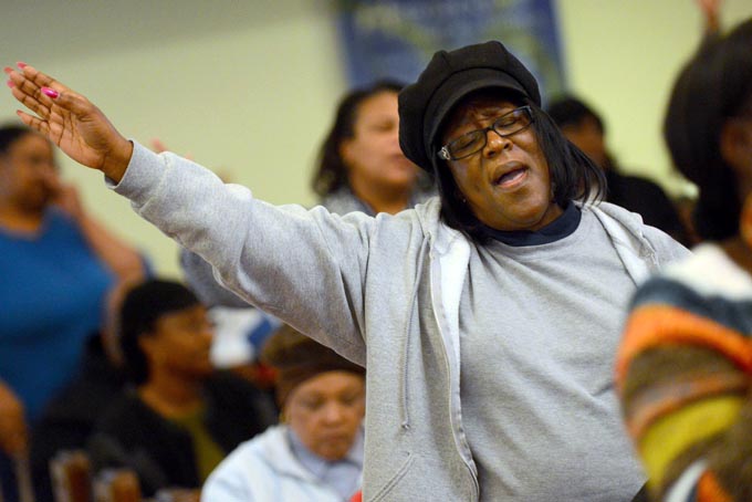 Barbara Allen raises her hands in prayer during the Concert of Prayer on Tuesday, Jan. 28, 2014, at Word Tabernacle Church in Rocky Mount, N.C. (AP Photo/The Rocky Mount Telegram, Hannah Potes)