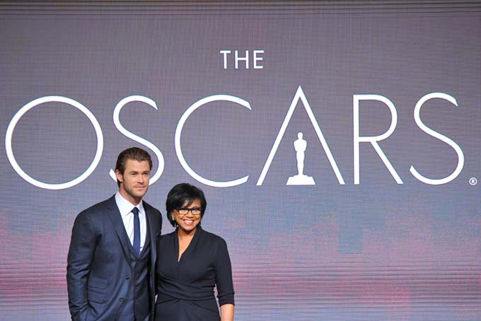 Chris Hemsworth, left, and President of the Academy Cheryl Boone Isaacs pose at the 86th Academy Awards nomination ceremony on Thursday, Jan. 16, 2014 in Beverly Hills, Calif.  (Photo by Vince Bucci/Invision/AP)