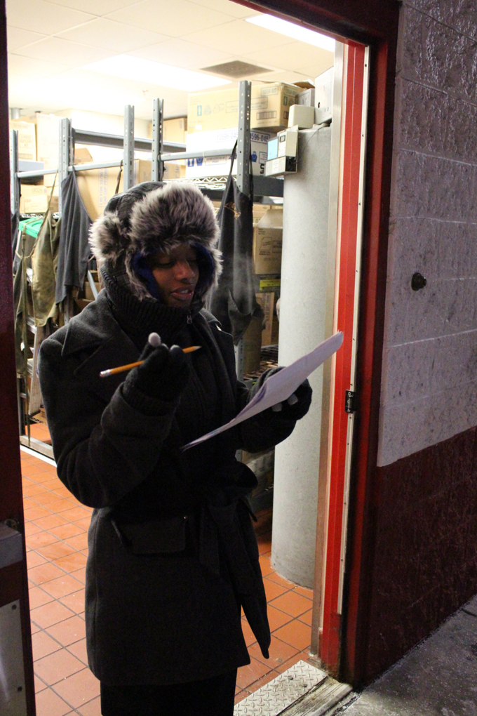 Maria Sellers checks off items being delivered to the McDonalds restaurant in Coraopolis, Pa., on Jan. 6. (AP Photo/Jesse Washington)