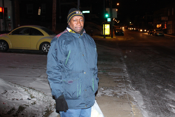 Quentin Milliner pauses for a photograph while walking home from a cigarette run to a convenience store in Coraopolis, Pa., on Monday, Jan. 6, 2014. (AP Photo/Jesse Washington)