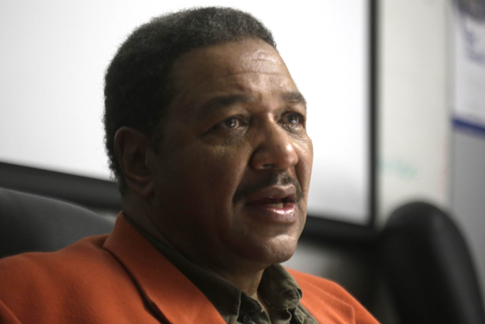 Detroit City Councilman George Cushingberry Jr. talks with a Detroit Free Press reporter in Detroit on Thursday, Jan. 9, 2014, about a ticket he was issued for failing to use a turn signal. (AP Photo/Detroit Free Press, Jarrad Henderon) 