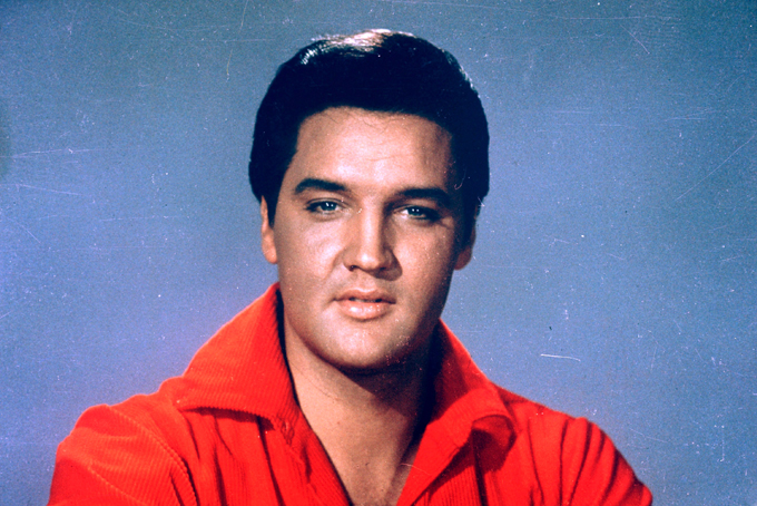 This 1964 file photo originally released by MGM shows Elvis Presley. Presley was born in Tupelo, Miss., on Jan. 8, 1935, and moved to Memphis with his parents at age 13. He was 42 when he died Aug. 16, 1977. (AP Photo/MGM, File)