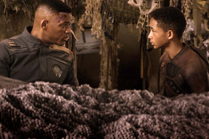 This film publicity image released by Sony - Columbia Pictures shows Will Smith, left, and Jaden Smith in a scene from "After Earth." (AP Photo/Sony, Columbia Pictures)