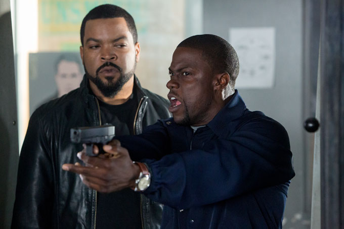 This image released by Universal Pictures shows Ice Cube, left, and Kevin Hart in a scene from "Ride Along." (AP Photo/Universal Pictures, Quantrell D. Colbert)