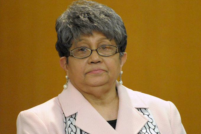 In this May 3, 2013 file photo, former Atlanta Public Schools Superintendent Beverly Hall stands as her attorney presents a motion at the Fulton County Superior Court hearing for several dozen Atlanta Public Schools educators facing charges alleging a conspiracy of cheating on the CRCT standardized tests in Atlanta. In March, a Fulton County grand jury indicted Hall and dozens of other administrators and teachers for allegedly engineering a sweeping effort to falsify standardized test results. A massive trial is expected in 2014. (AP Photo/David Tulis, File).