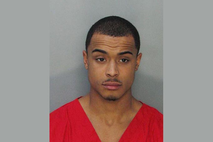 This police booking mug made available by the Miami-Dade County Corrections Department shows R&B singer Khalil Amir Sharieff, Thursday, Jan. 23, 2014. (AP Photo/ Miami Dade County Jail)