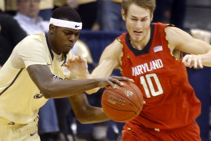 Pittsburgh's Durand Johnson, left, knocks the ball away from Maryland's Jake Laymanin the second half of an NCAA college basketball game on Monday, Jan. 6, 2014, in Pittsburgh. Pittsburgh won 79-59.(AP Photo/Keith Srakocic)