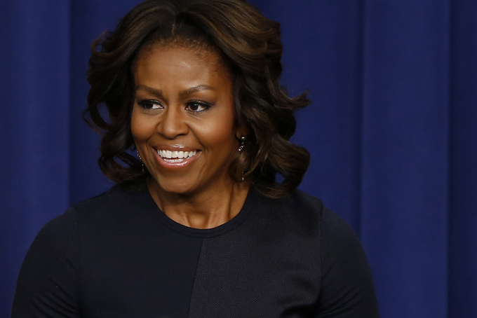 First lady Michelle Obama speaks in the Eisenhower Executive Office Building on the White House complex in Washington, Thursday, Jan. 16, 2014. (AP Photo/Charles Dharapak)