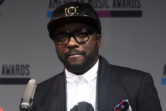  In this Oct. 10, 2013 file photo, Will.i.am announces the nominees for the American Music Awards, on Thursday, Oct. 10, 2013 in New York. (Photo by Charles Sykes/Invision/AP, File)