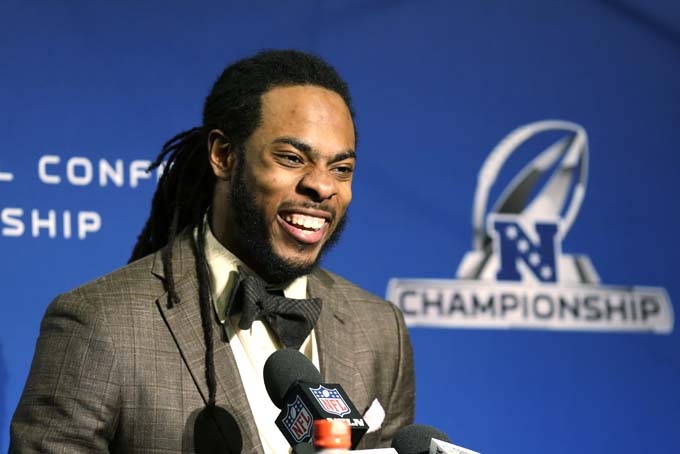 Seattle Seahawks' Richard Sherman speaks at a news conference after the NFL football NFC Championship game between the Seahawks and the San Francisco 49ers Sunday, Jan. 19, 2014, in Seattle. The Seahawks won 23-17 to advance to Super Bowl XLVIII. (AP Photo/Elaine Thompson)