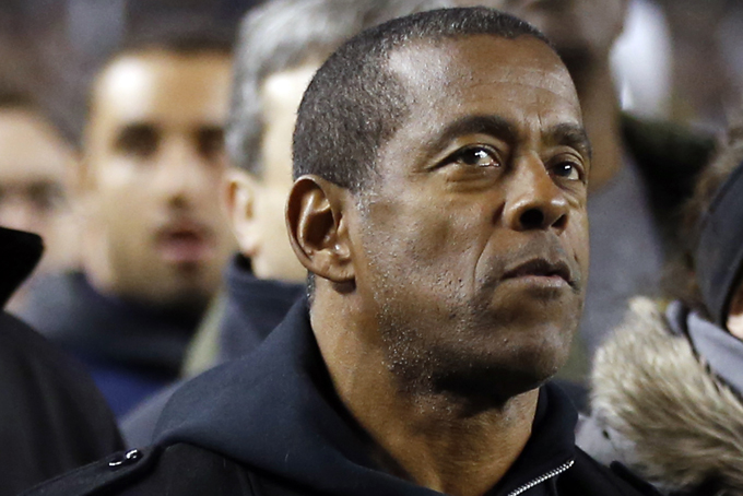  In this Nov. 9, 2013, file photo, former Pittsburgh and NFL Hall of Fame running back Tony Dorsett stands on the sideline before the start of an NCAA football game between Pittsburgh and Notre Dame in Pittsburgh. Dorsett is one of more than 4,500 former players that have filed suit, some accusing the NFL football league of fraud for its handling of concussions. (AP Photo/Keith Srakocic, File)   