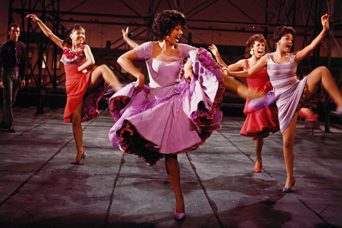This photo provided by courtesy of MGM Home Entertainment shows Rita Moreno, center, as Anita, in the 1961 musical, "West Side Story." Moreno won an Academy Award as best supporting actress for her performance. Moreno is the 50th SAG Life Achievement recipient, to be honored at the Screen Actors Guild Awards, Saturday, Jan. 18, 2014, in Los Angeles. (AP Photo/Courtesy MGM Home Entertainment)