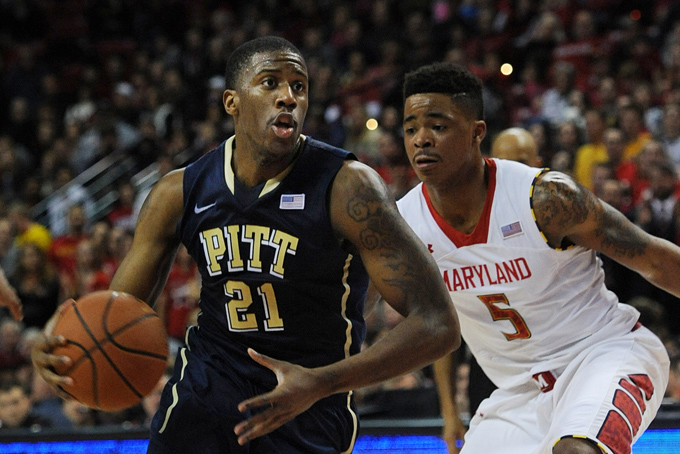 Pittsburgh's Lamar Patterson, left, drives the ball to the basket and past Maryland's Nick Faust in the second half of an NCAA college basketball game Saturday, Jan. 25, 2014, in College Park, Md. Pittsburgh won 83-79. (AP Photo/Gail Burton)