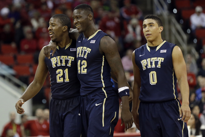 Pitt's Lamar Patterson (21), Talib Zanna (42) and James Robinson (0) react towards the end of an NCAA college basketball game against North Carolina State in Raleigh, N.C., Jan. 4. (AP Photo/Gerry Broome)
