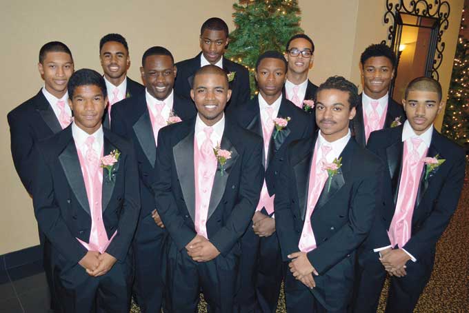 HANDSOME ESCORTS—Joel Akrie, Tyelre Davis, Quincy Harding, Derrick Hodge, Arthur King, Joel Macklin, Brandon McClung, Malcolm Mitchell, Jonathan Powell, Abner Roberts and Emmanuel Walker