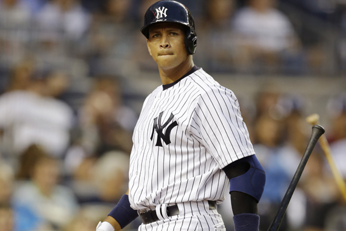 In this Aug. 20, 2013 file photo, New York Yankees Alex Rodriguez reacts after striking out in the second inning of the second game of a baseball doubleheader at Yankee Stadium in New York. (AP Photo/Kathy Willens)