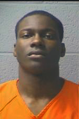 This image provided by the Orangeburg-Calhoun Regional Detention Center shows Justin Bernard Singleton, 19, of Charleston. (AP Photo/Orangeburg-Calhoun Regional Detention Center)