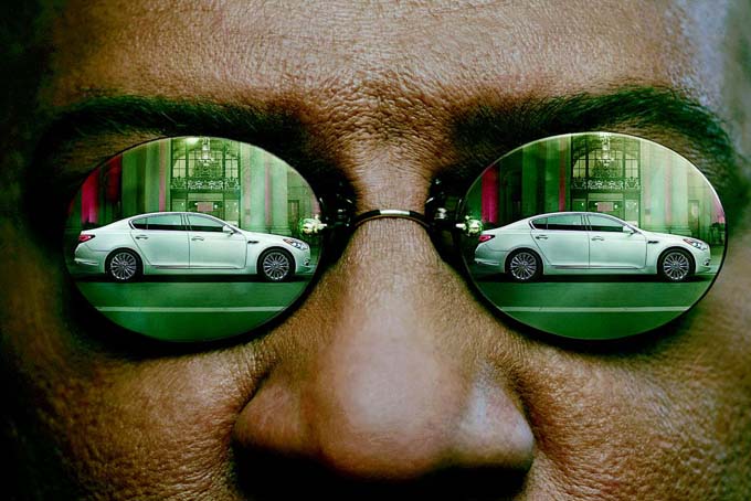  This undated frame grab provided by Kia shows the company's 2014 Super Bowl commercial. The third-quarter ad to introduce its K900 luxury sedan, features Laurence Fishburne reprising his “Matrix” role as Morpheus and displays some surprising operatic skills.. (AP Photo/Kia)