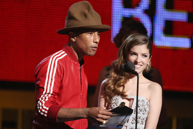 Pharrell Williams, left, and Anna Kendrick present the award for best new artist at the 56th annual Grammy Awards at Staples Center on Sunday, Jan. 26, 2014, in Los Angeles. (Photo by Matt Sayles/Invision/AP)