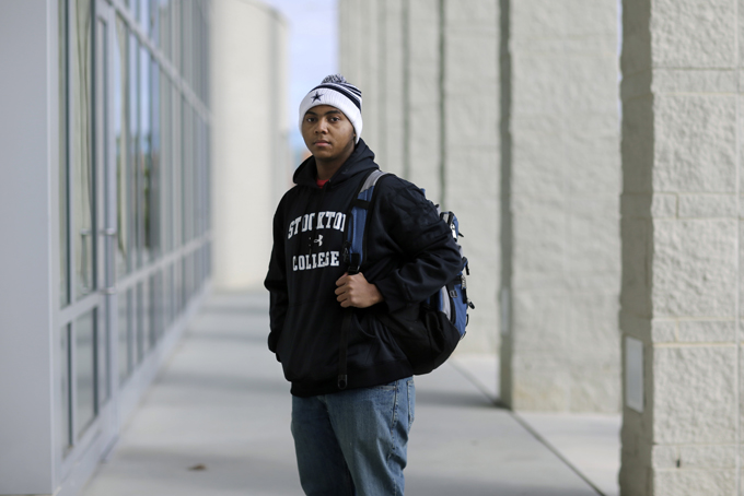 Political science student La'Shon Callaway, 19, of Egg Harbor Township, N.J., poses for a photograph as he stands on the campus of The Richard Stockton College of New Jersey, in Galloway, N.J., Tuesday, Dec. 31, 2013. Callaway is optimistic that racial discrimination will continue to decline over his lifetime. "People are getting tired of it, and fed up," said Callaway. "They’re realizing even if you’re not the same color as me, you’re still a person and I’m still a person." (AP Photo/Mel Evans)