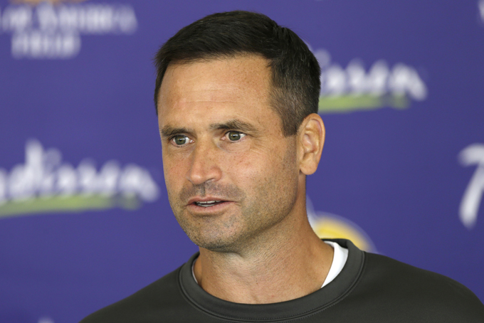  In this July 27, 2013, photo, Minnesota Vikings special teams coordinator Mike Priefer speaks to reporters following practice at NFL football training camp in Mankato, Minn. (AP Photo/Charlie Neibergall)