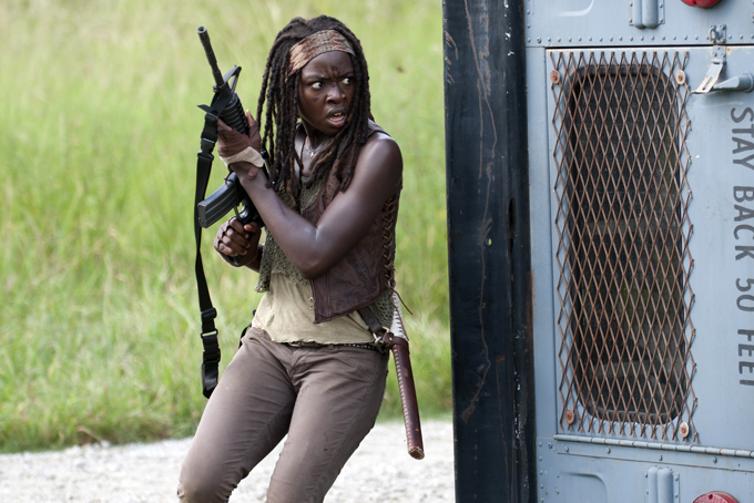 This file publicity image released by AMC shows Danai Gurira as Michonne in a scene from the series "The Walking Dead," which resumes episodes from its fourth season on Feb. 9.(AP Photo/AMC, Gene Page)
