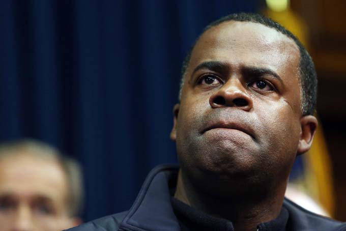 Atlanta Mayor Kasim Reed listens to a question about the city's response to the snow storm during a news conference Wednesday, Jan. 29, 2014 in the Governor's office at the State Capitol in Atlanta. A rare snowstorm left thousands across the U.S. South frozen in their tracks, with workers sleeping in their offices, students camping in their schools, and commuters abandoning cars along the highway to seek shelter in churches or even grocery stores. (AP Photo/Atlanta Journal-Constitution, Ben Gray) 