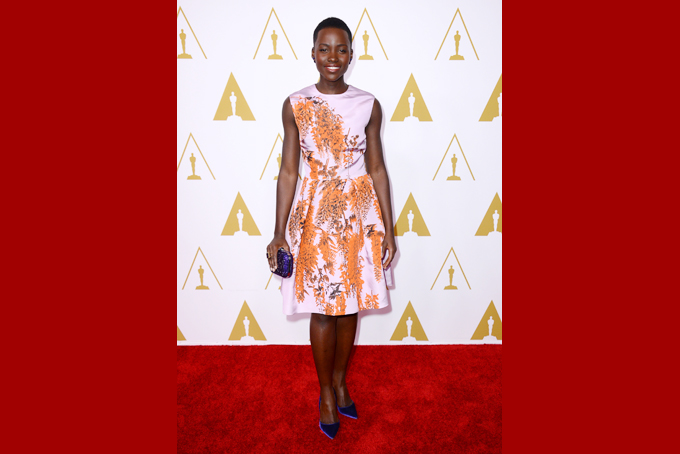 Lupita Nyong'o arrives at the 86th Oscars Nominees Luncheon, on Monday, Feb., 10, 2014 in Beverly Hills, Calif. (Photo by Jordan Strauss/Invision/AP)   