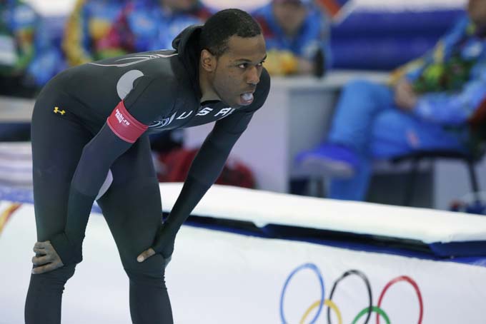 Shani Davis of the U.S. gestures in dejection after competing in the men's 1,000-meter speedskating race at the Adler Arena Skating Center during the 2014 Winter Olympics in Sochi, Russia, Wednesday, Feb. 12, 2014. (AP Photo/Matt Dunham)