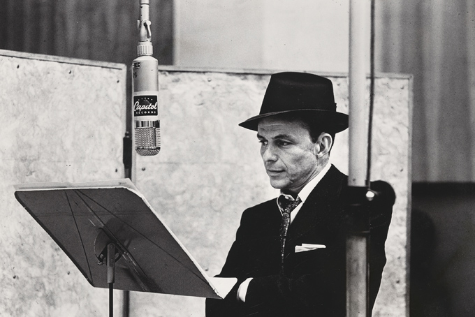 This handout photo provided by the National Portrait Gallery, taken in 1956, shows Frank Sinatra, by Herman Leonard. (AP Photo/Herman Leonard, National Portrait Gallery)