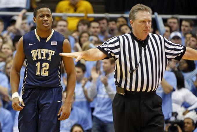 Pittsburgh's Chris Jones (12) reacts to a foul during the first half of an NCAA college basketball game against the North Carolina in Chapel Hill, N.C., Saturday, Feb. 15, 2014. North Carolina won 75-71. (AP Photo/Karl B DeBlaker)