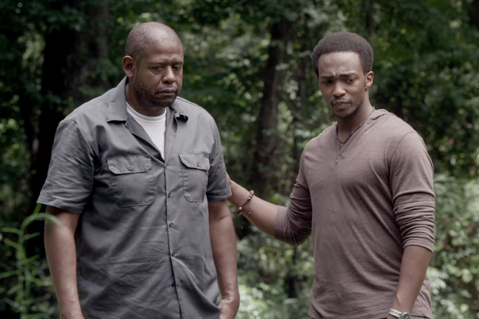 This photo provided by Codeblack Films shows Forest Whitaker, left, as Angel and Anthony Mackie as Tommy, in a scene from the film, "Repentance." He plays the role of the bipolar Angel Sanchez, who seeks private treatment from a spiritual adviser before taking him hostage in the basement of the home where he and his young daughter reside. Whitaker took on a new challenge to grow in the psychological thriller which releases Friday, Feb. 28, 2014. (AP Photo/Codeblack Films, Patti Perret)