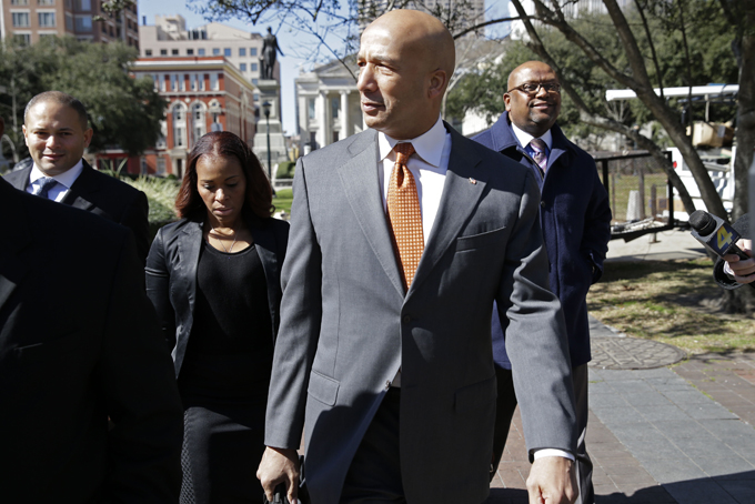 Former New Orleans Mayor Ray Nagin enters Federal Court in for jury selection and possible opening arguments for his corruption trial in New Orleans, Thursday, Jan. 30, 2014. (AP Photo/Gerald Herbert)