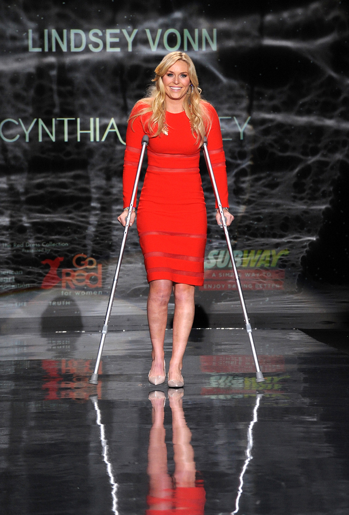 Lindsey Vonn works the runway as a special guest of SUBWAY Restaurants at the Go Red For Women The Heart Truth Red Dress Collection 2014, made possible by Macy's and SUBWAY Restaurants, Thursday, Feb. 6, 2014, during Fashion Week in New York. (Photo by Diane Bondareff/Invision for SUBWAY Restaurants/AP Images)