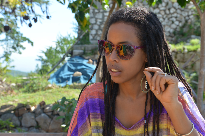  In this Jan. 4, 2014 photo, Donisha Prendergast, the eldest granddaughter of reggae icon Bob Marley, speaks during an interview on a hilltop known to Rastafarians as “Pinnacle” in Sligoville, Jamaica. (AP Photo/David McFadden)