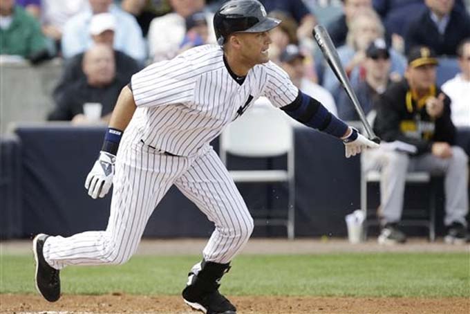 New York Yankees shortstop Derek Jeter grounds out during the fourth inning of an exhibition baseball game against the Pittsburgh Pirates Thursday, Feb. 27, 2014, in Tampa, Fla. (AP Photo/Charlie Neibergall)