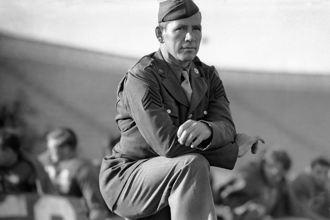  In this Nov. 20, 1942 file photo, Sgt. Marty Brill, football coach of Santa Ana Army Air Base, stands on the sidelines in Los Angeles. (AP Photo)