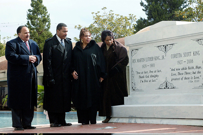 In this file photo taken Nov. 20, 2006 the children of the Rev. Martin Luther King Jr. and Coretta Scott King from left, Martin Luther King III, Dexter King, the late Yolanda King and Bernice King stand next to a new crypt dedicated to their parents in Atlanta. (AP Photo/W.A. Harewood, File)