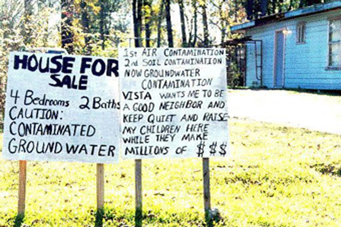 Sign in front of a Mossville home for sale. (Photo courtesy of MEAN)