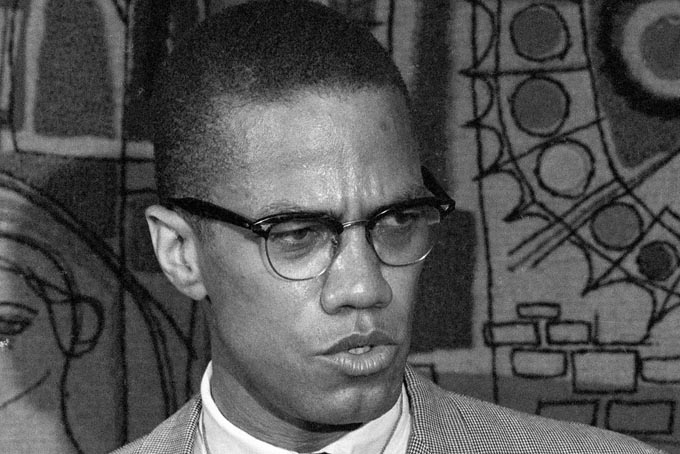  This March 12, 1964 file photo, Malcolm X addresses reporters at the Hotel Park-Sheraton in New York.  (AP Photo, File)