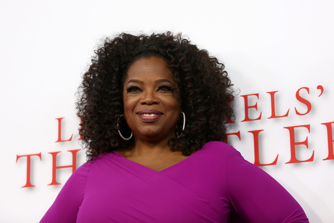  In this Aug. 12, 2013 file photo, Oprah Winfrey arrives at the Los Angeles premiere of "Lee Daniels' The Butler" at the Regal Cinemas L.A. Live Stadium 14, in Los Angeles. (Photo by Matt Sayles/Invision/AP, file)