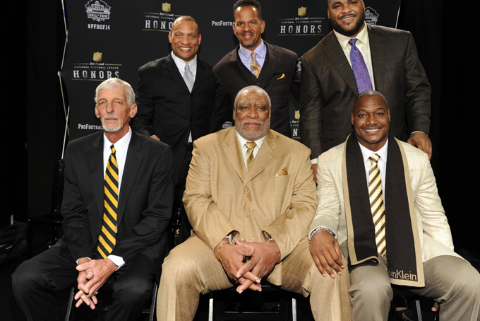 Clockwise from top left, defensive back Aeneas Williams, wide receiver Andre Reed, offensive tackle Walter Jones, linebacker Derrick Brooks , defensive lineman Claude Humphrey and punter Ray Guy pose for a photo at the NFL Honors show Saturday, Feb. 1, 2014 at Radio City Music Hall in New York. (Photo by Frank Micelotta/Invision for NFL/AP Images)