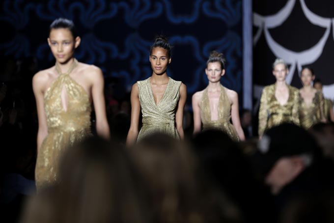 The Fall 2014 Diane von Furstenberg collection is modeled during Fashion Week in New York, Sunday, Feb. 9, 2014. (AP Photo/Seth Wenig)