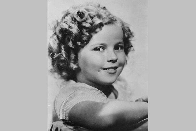 In this November 1936 file photo, 8-year-old U.S. American child movie star Shirley Temple is portrayed in Hollywood, Calif. (AP Photo/File)